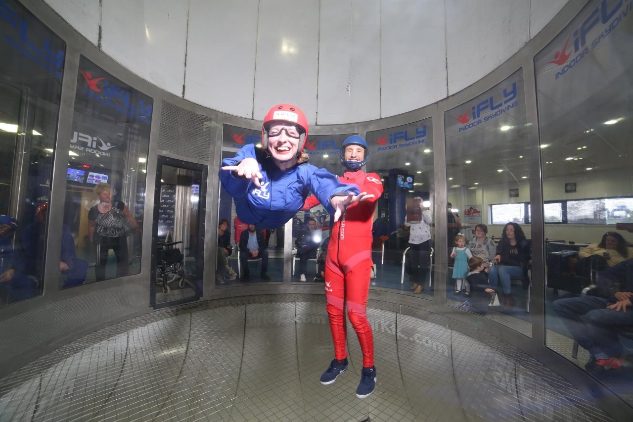 person trying indoor sky diving